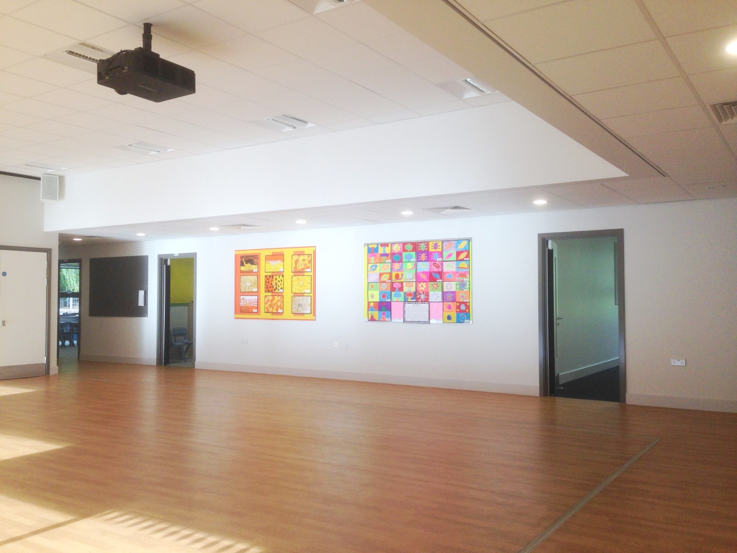 A large hall with a projector