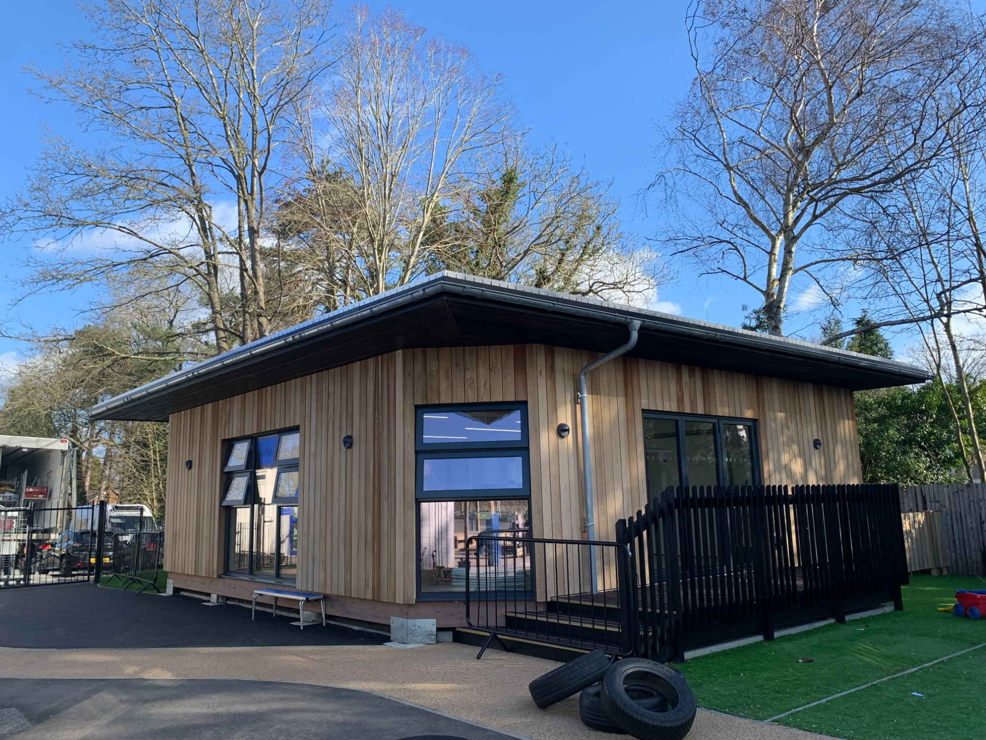 A wooden building in the sunshine