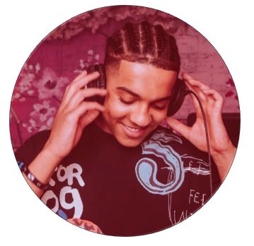 A man smiles while dj - ing